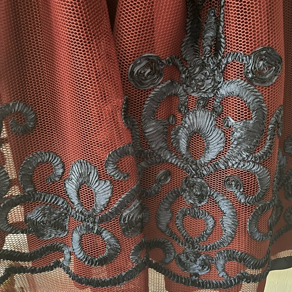 Burgundy and navy blue V neck dress with bow and navy blue design at the bottom - Picture 2 of 3